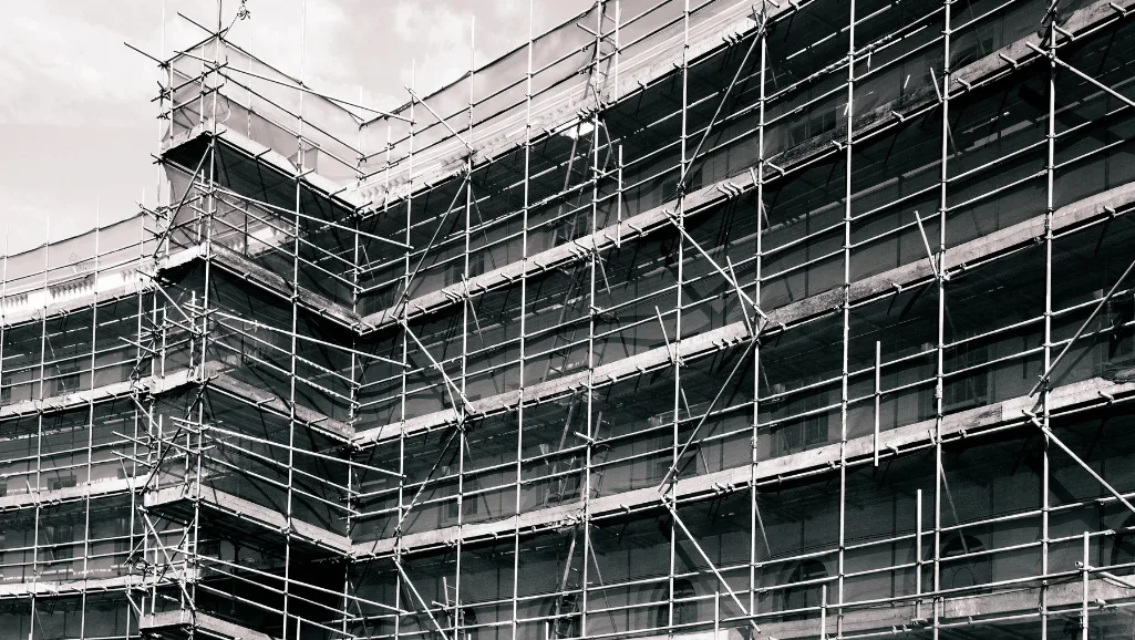 Scaffolding accessories including cross braces, guard rails, and access ladders